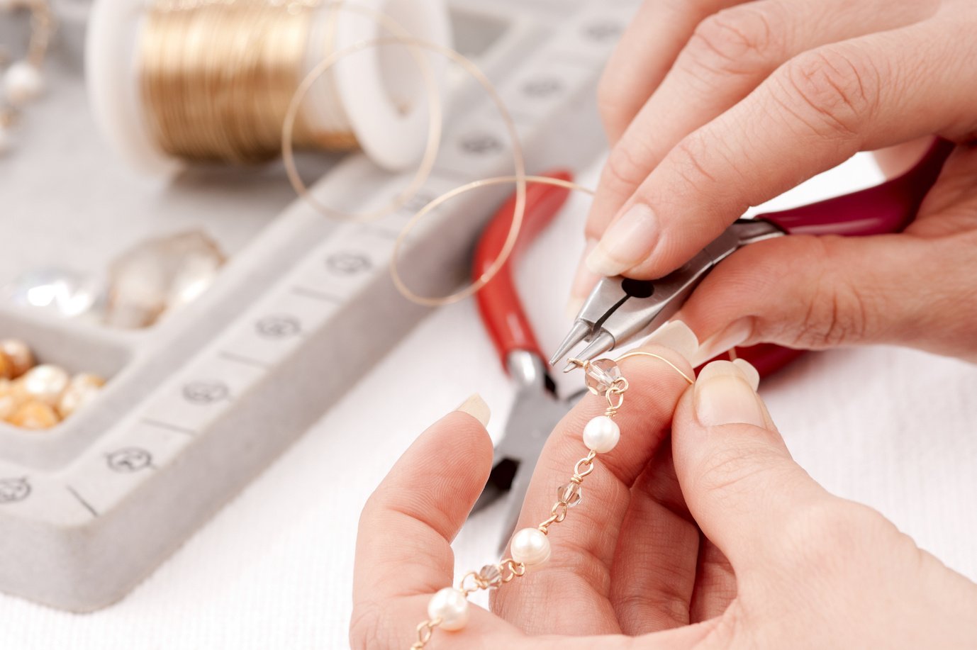 Hands Making Jewelry